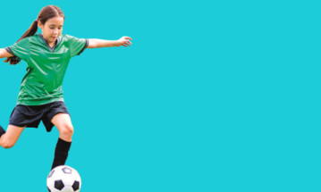 Child playing football